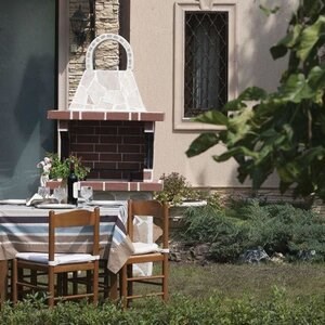 Petit barbecue de jardin traditionnel (charbon de bois/bois, 100x60x210 cm, 650 kg, pierre naturelle de Rhodes, brique)